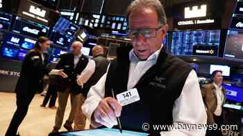 Wall Street and the dollar tumble as investors retreat further from U.S.