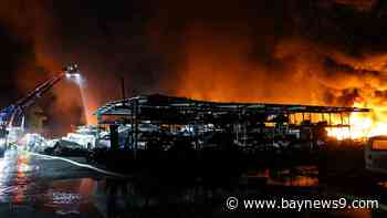 Firefighters respond to large salvage yard fire in Gibsonton