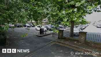 Arrests after man injured in car park shooting
