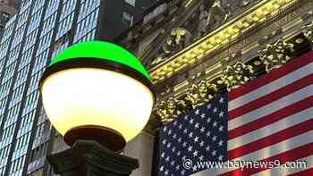 Wall Street rallies to recover some of its sharp losses as the dollar and U.S. bond market steady