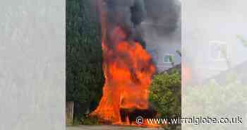 Firefighters called as car goes up in flames on Wirral street