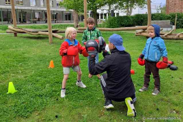 Kinderen trotseren regendruppels tijdens Buitenspeeldag