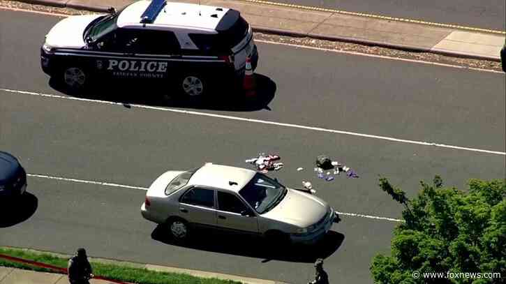Virginia police officers shot during traffic stop near popular shopping center; suspect arrested