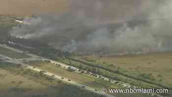 Crews respond to large brush fire in western Broward County