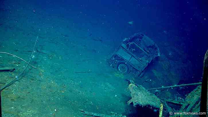 Divers discover vintage car in WWII shipwreck