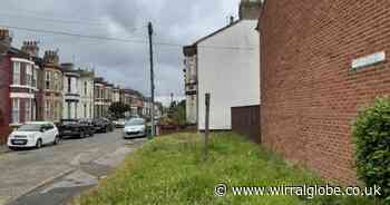 Three people charged after man shot on Wirral street