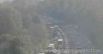 Traffic at a standstill and long delays after crash on M56