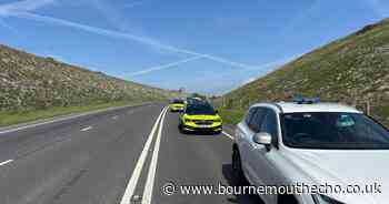 Two people seriously injured and main road closed after crash