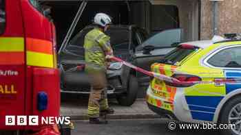 Driver injured after crashing into building
