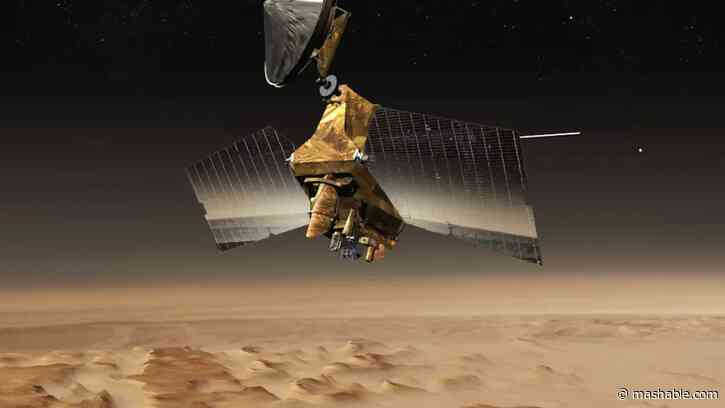 Spacecraft spots NASA rover driving through Mars desert
