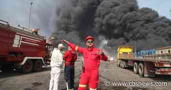 Iranian port hit by massive explosion, killing 8, injuring hundreds, officials say