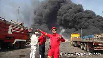 Iran's president visits victims port explosion that killed at least 28, injured around 1,000