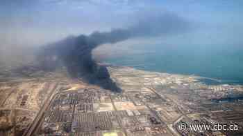 Iran president visits injured, calls for probe into port explosion that killed dozens