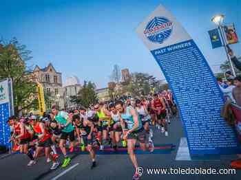 Photo Gallery: Glass City Marathon runners set winning pace