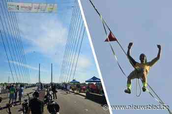Sprintje op een koord op 60 meter hoogte: Braziliaan kroont zich tot wereldkampioen highline op Tuikabelbrug in Hasselt