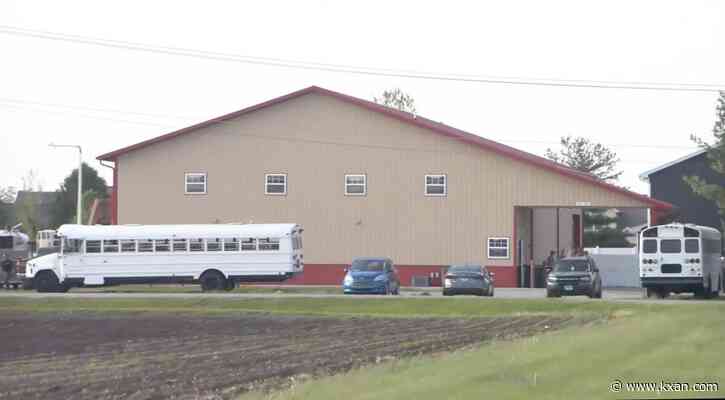 Four people were killed when vehicle smashed through Illinois building, police say