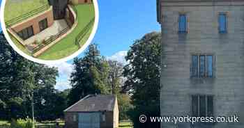 Turfed-roof home with subterranean courtyard plans for listed mansion near York