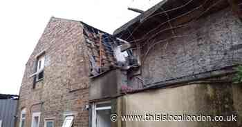Fire in Walthamstow destroys part of flat and roof above shops