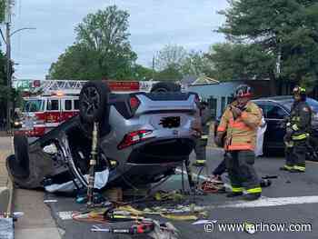 NEW: Driver rescued from overturned vehicle after crash on Langston Blvd