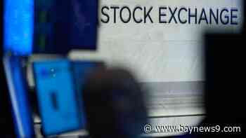 Wall Street drops following signals that the U.S. economy is sputtering