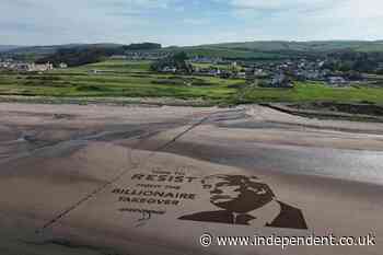 Activists unveil large Donald Trump protest art near US president’s golf resort