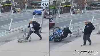 Video shows man push shopping cart into Toronto bike lane, sending rider crashing