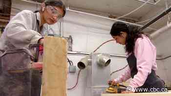 A group of Winnipeg Grade 10 girls are helping make beds for kids in need