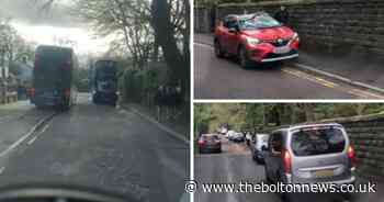 Buses driving on pavement and parking on double yellows - traffic issues near school
