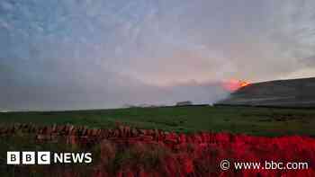 Four crews remain at scene of moorland fire