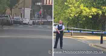 Police cordon Limehouse road after stabbing - recap