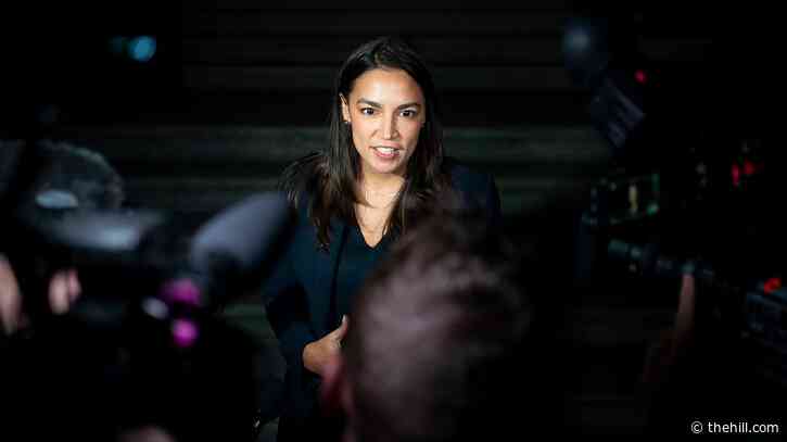 Ocasio-Cortez hits Trump immigration agenda as hecklers disrupt town hall