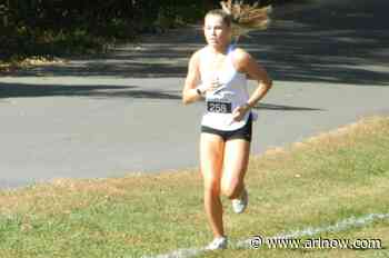 Three runners from Arlington win races at track-and-field meet