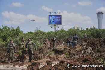 A missile from Yemen halts flights in Israel hours before top officials vote on plans for Gaza war