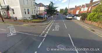 Jogger 'punched in the head and robbed by two men with knives' in Epsom