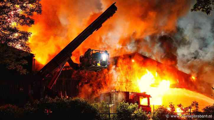 Regen van glasdeeltjes bij uitslaande brand op industrieterrein