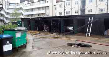 Row of garages destroyed in battery fire in Surbiton