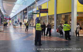 Man detained as visible police presence spotted in Warrington town centre