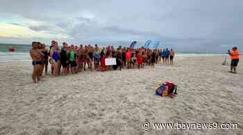 Clearwater Beach lifeguards swim an ocean mile to raise money for Tampa Bay Crisis Center