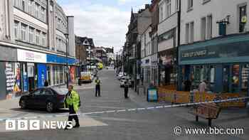 Customer stabbed to death in city centre bank