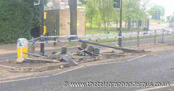 Crossing near school out of action and traffic light destroyed with cordon in place