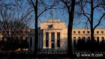 Federal Reserve holds rates steady as it warns of rising economic risks