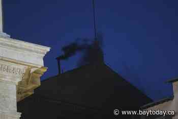 Black smoke pours from Sistine Chapel chimney, indicating no pope was elected as conclave opens