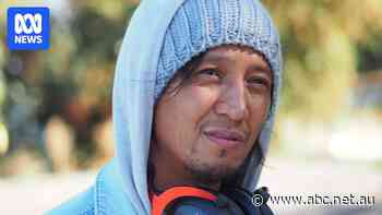 Rough sleepers camp at site of long-delayed social housing project