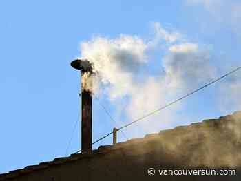 White smoke pours out of the Sistine Chapel chimney, signalling the election of a new pope