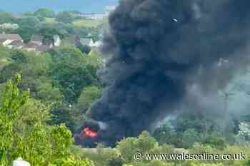 Fire crews deal with huge fire as smoke seen for miles