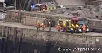 Car reported to have entered sea at Scarborough Harbour