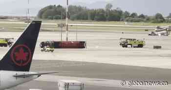Fuel tanker flips on side at Vancouver airport, injuring driver