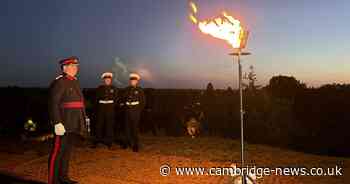 Stunning pictures as special Cambridgeshire beacon lit for VE Day