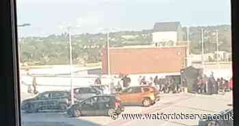 Crews with 'armed police' actors seen filming in atria Watford car park