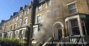 Neighbours evacuated as firefighters battle blaze at Hackney flat